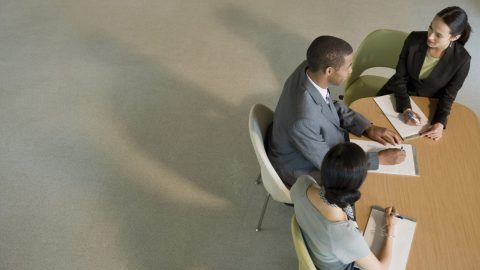 ADHD adult delegating some tasks to colleagues at work