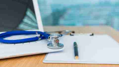 Doctor's laptop and stethoscope, important tools for accurate diagnoses.