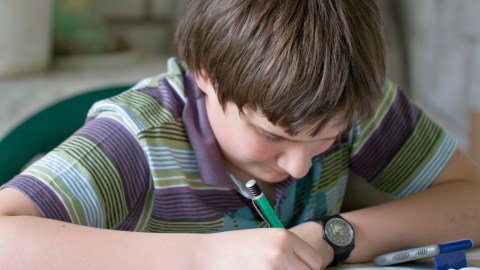A student times himself on his assignments to avoid daydreaming, procrastination, and homework stress.