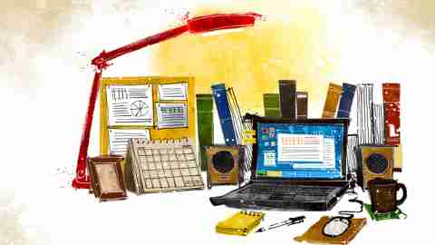 The work space of someone with ADHD; a very cluttered desk